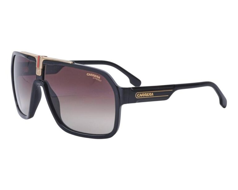 Homme stylé portant les lunettes de soleil Carrera 1014-S, parfaites pour un look moderne et affirmé